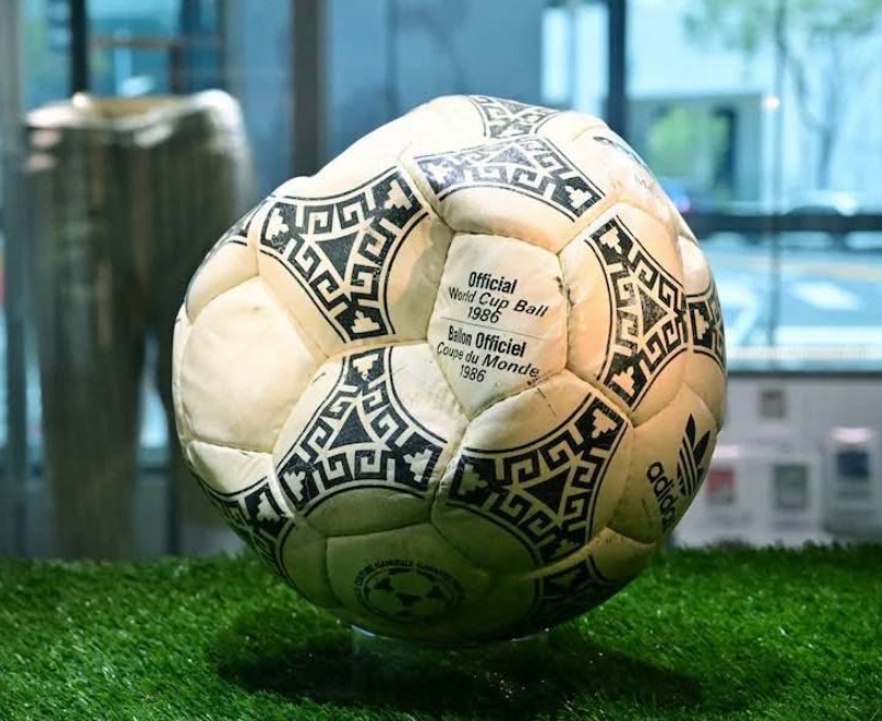 Football graphic representing Diego Maradona’s 1986 Hand of God ball auction